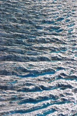 Meltwater pools on the surface of the Sermeq Avannarleq Glacier in southwest Greenland.