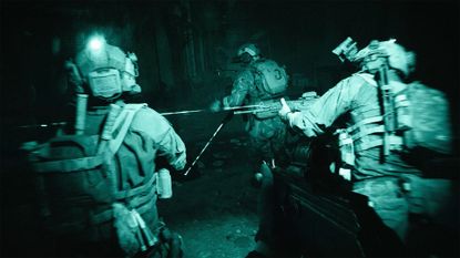Battlefield 6 screenshot displaying soldiers creeping through a building in the dark, with night vision illuminating their silhouettes 