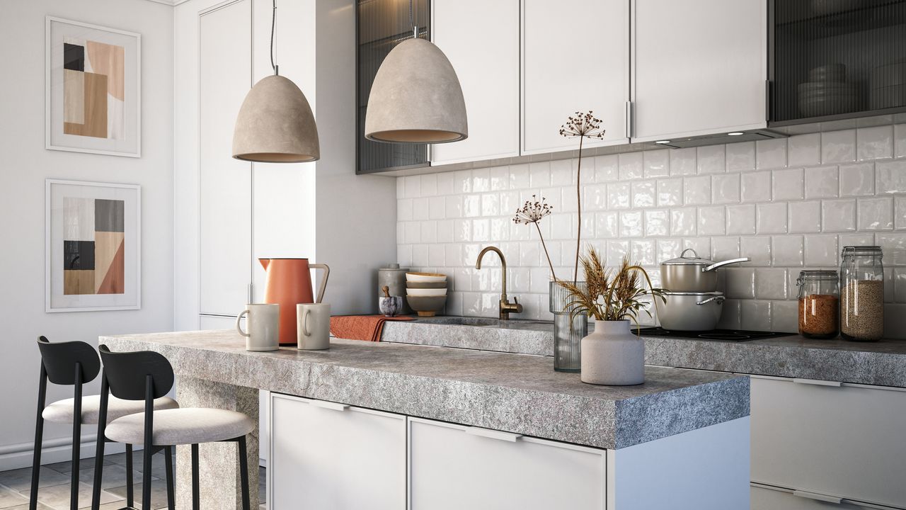 Small kitchen with gray countertop and pendant lights