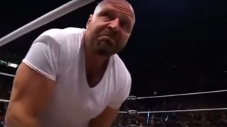 An angry Jon Moxley in a white t-shirt on AEW