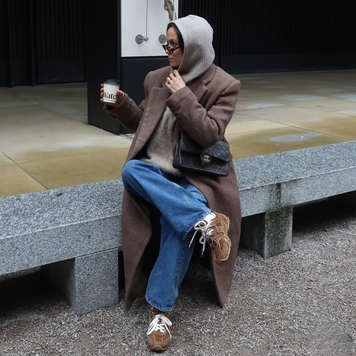 Fashion person Felicity Bird @felicitymbird wears a London Spring capsule wardrobe 2026. She wears a hood.