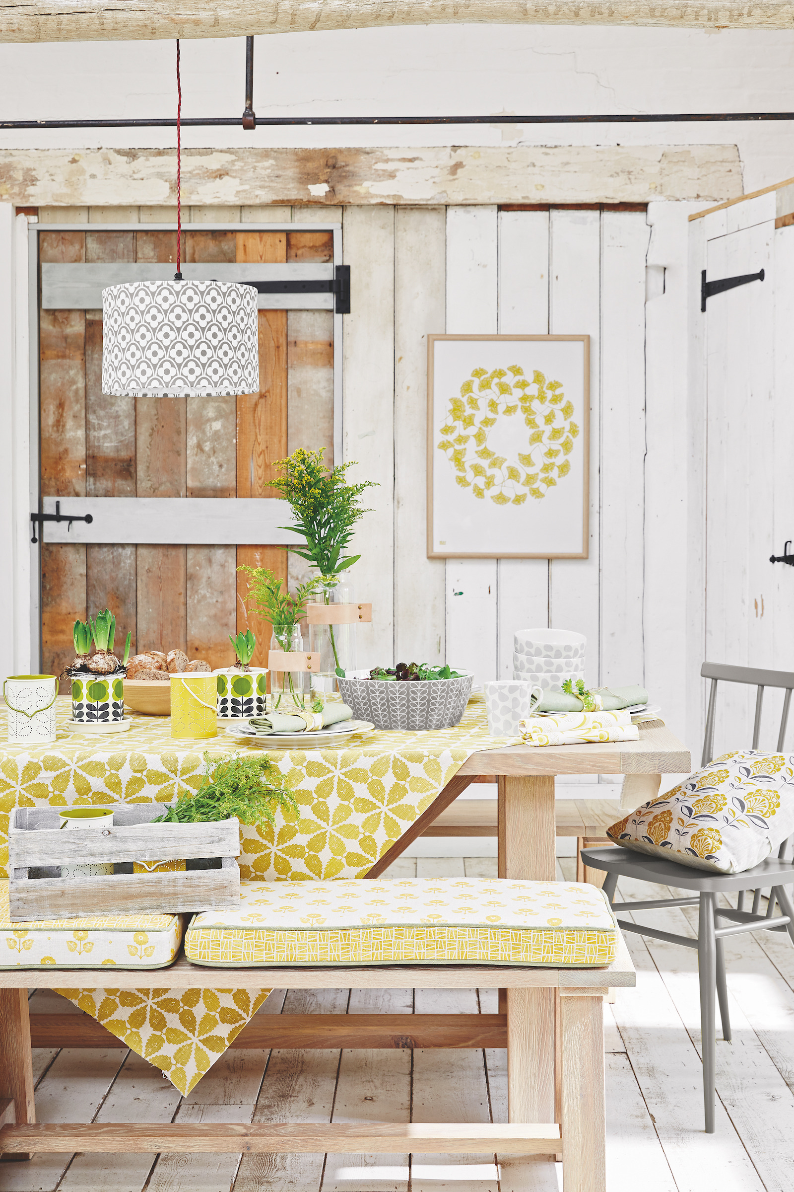 dining room with farmhouse barn door and yellow fabric