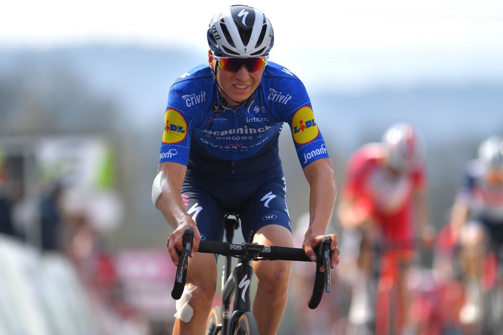 MUR DE HUY BELGIUM APRIL 21 Mauri Vansevenant of Belgium and Team Deceuninck QuickStep on arrival during the 85th La Fleche Wallonne 2021 Men Elite a 1936km race from Charleroi to Mur de Huy 204m FlecheWallonne on April 21 2021 in Mur de Huy Belgium Photo by Luc ClaessenGetty Images