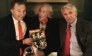 Tony Chambers, William Kleine and Sir Don McCullin sat next to each other. Tony, left, is presenting William with a copy of a Wallpaper magazine.