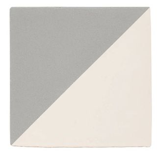 Grey and white split tile on white background