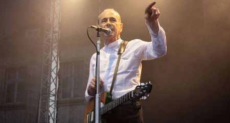 Francis Rossi makes his point to the crowd during a 2024 Status Quo gig.