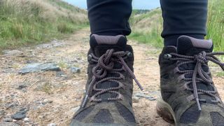Close up of hiking boots on the trail