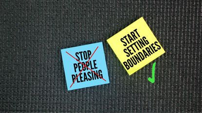 Sticky notes that say "stop people pleasing" and "start setting boundaries" on a textured black background. 