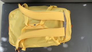 Close up for backpack straps on Fjallraven High Coast Duffel 36 in yellow