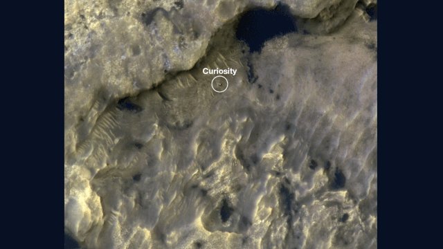 This GIF shows the position of NASA's Mars rover Curiosity rover as it journeyed through "the clay-bearing unit" on Mars between May 31 and July 20, 2019. The HiRISE camera on NASA's Mars Reconnaissance Orbiter took both images.