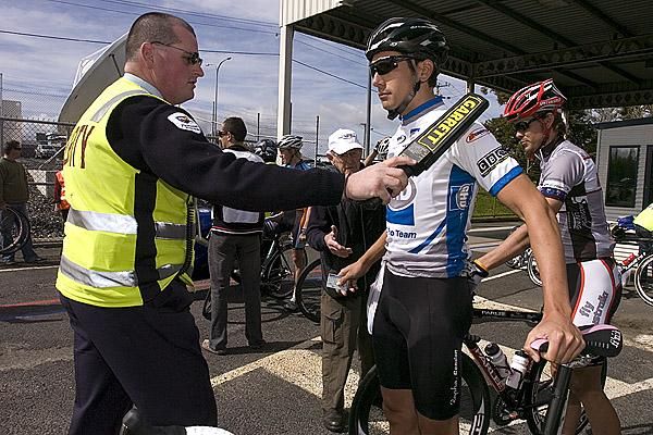 Darren Lapthorne (GHD-Burnie) has a security guard frisk him at the entrance to the Spirit of Tasmania before the tour started from beneath it's bowels.
