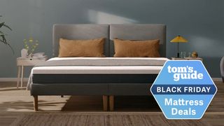 Emma Mattress shown on a fabric bed frame and with a Black Friday mattress deals badge overlaid on the image