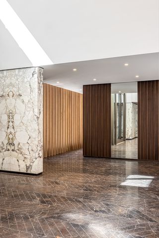 One High Line lobby with marble and wood