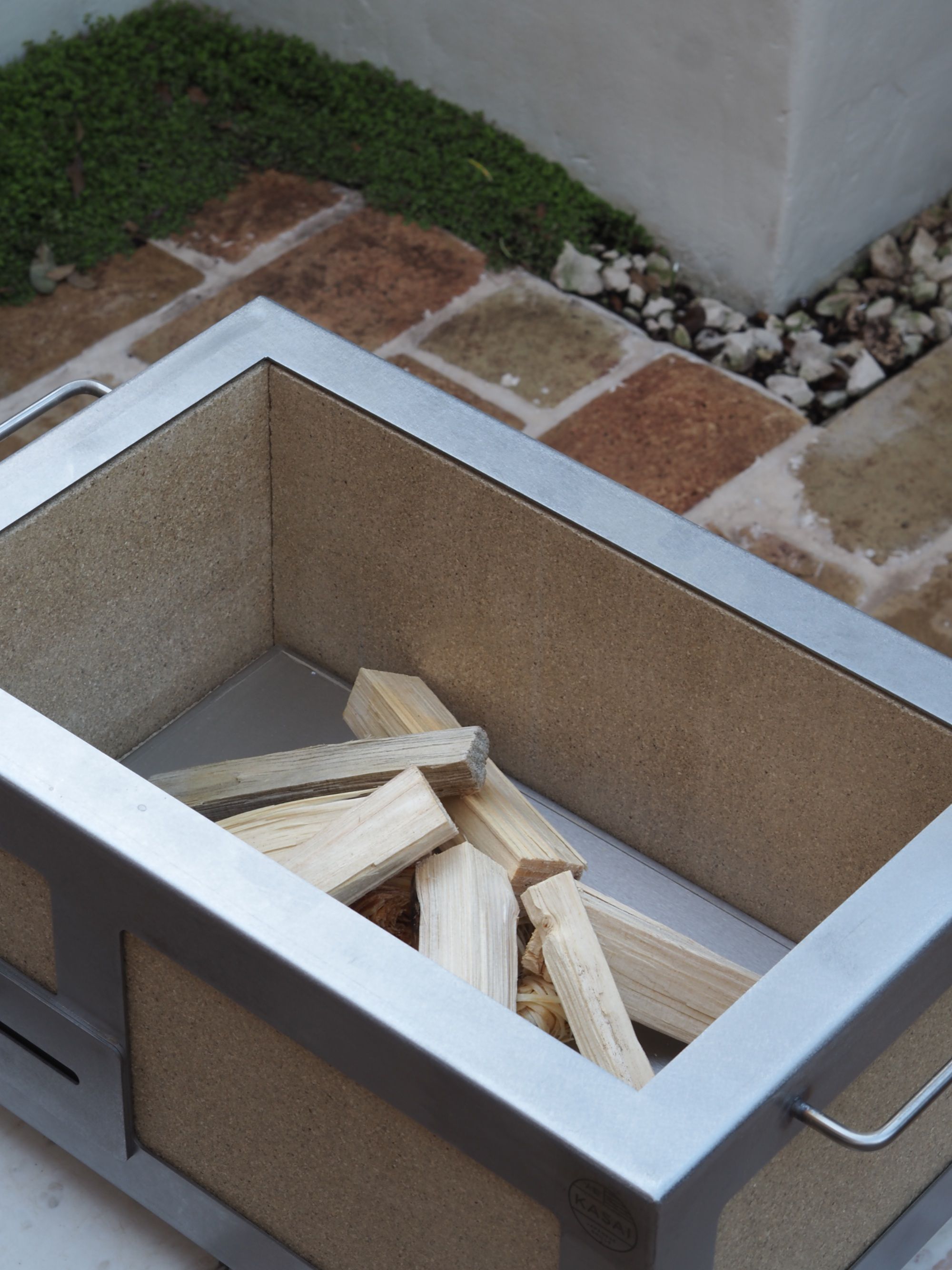 a kasai bbq grill in a garden 