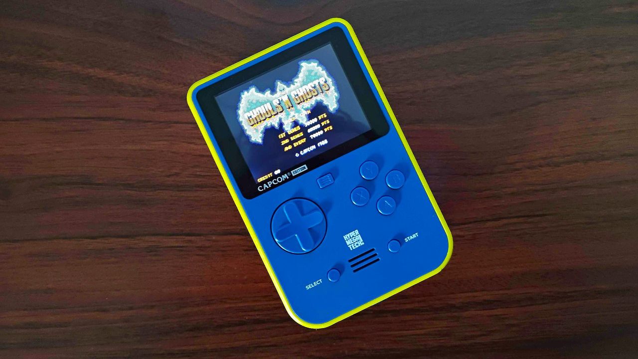Super Pocket on wood desk with Ghosts and Ghost title on screen