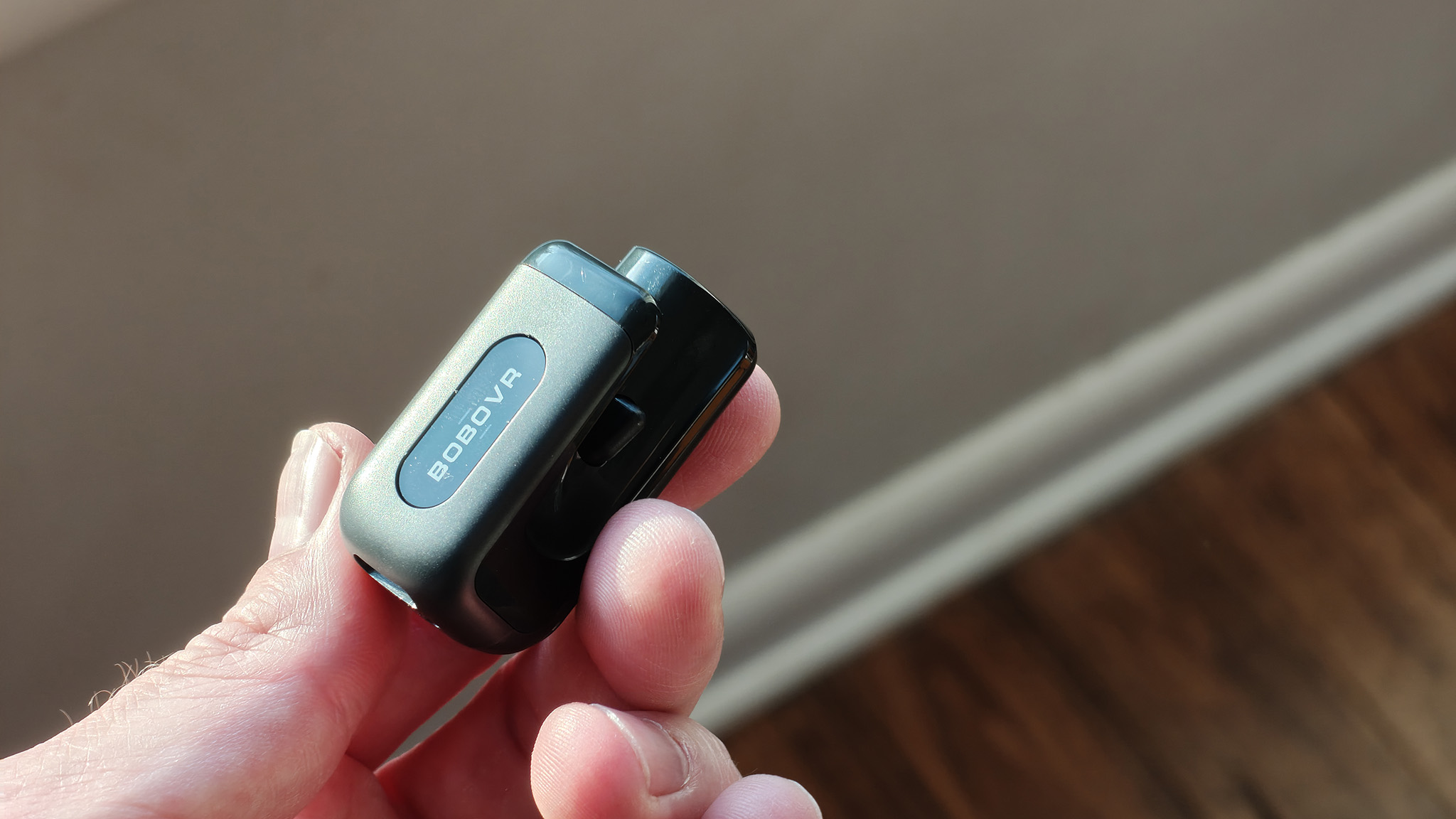 Holding a BoboVR CG2 battery