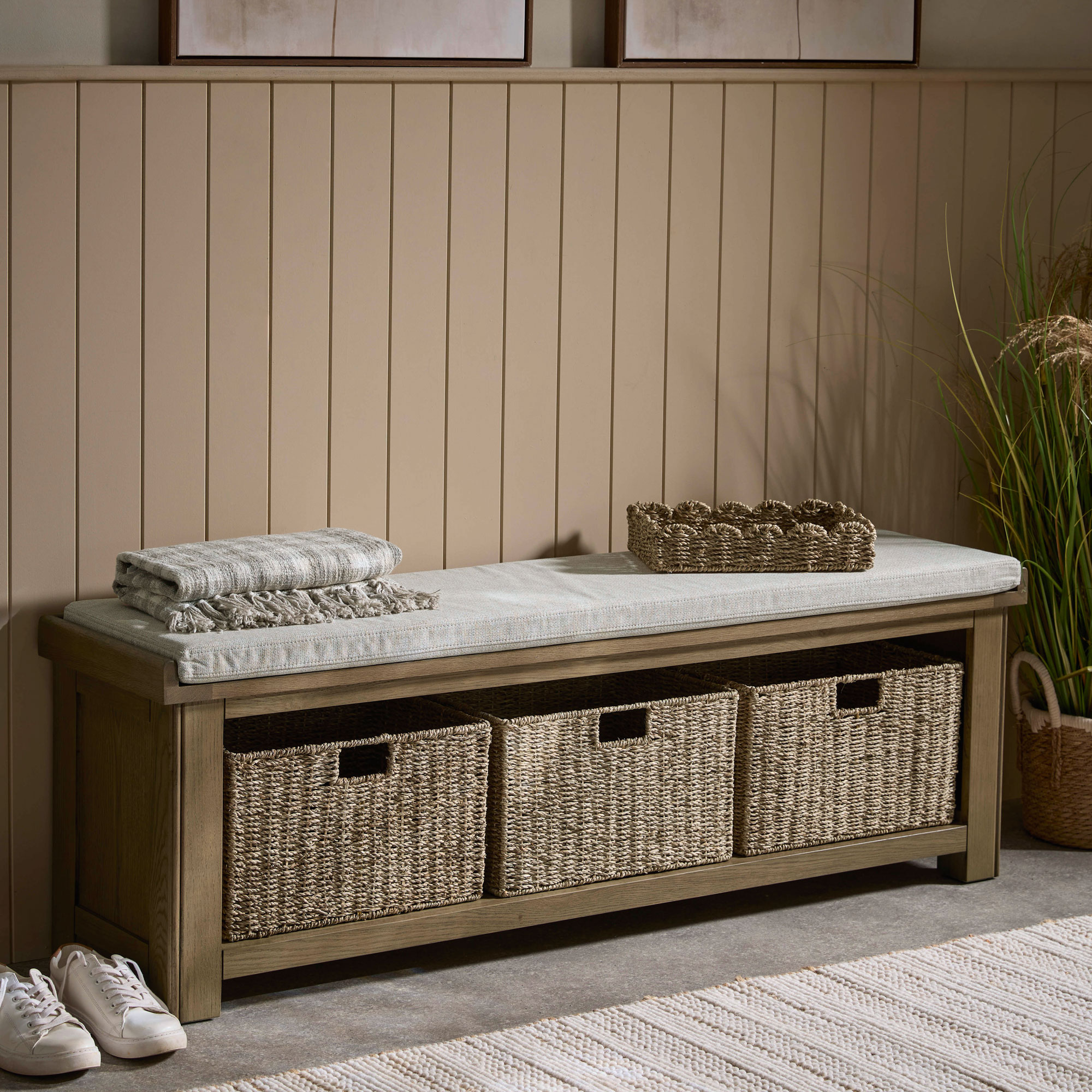Beige wall panelling and storage bench