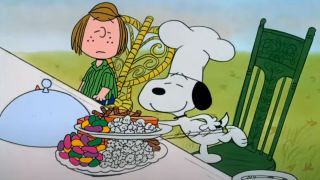 Snoopy serving Peppermint Patty