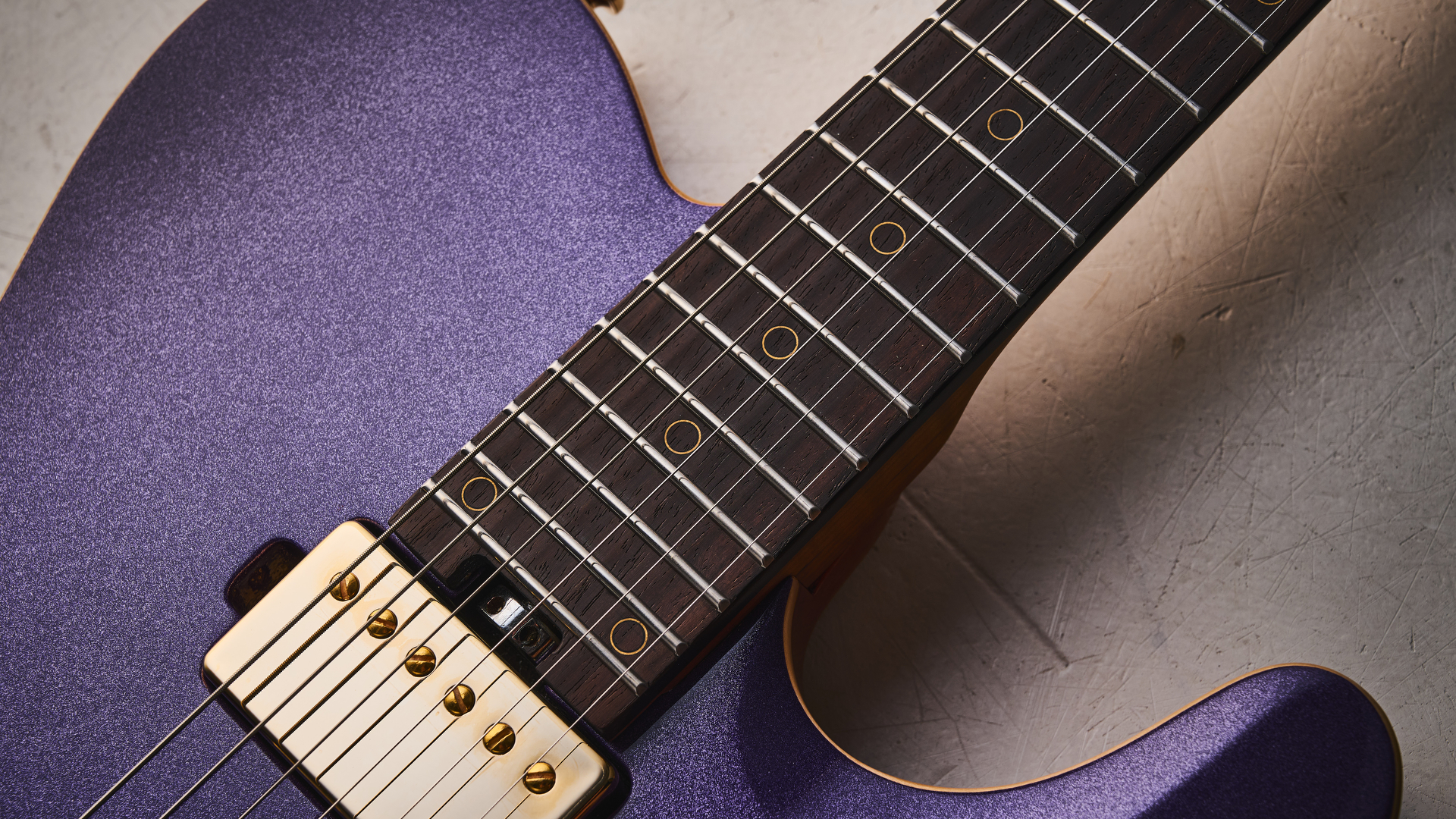 Harley Benton Fusion-T II HH RW HT in Purple Metallic finish with gold hardware. Shot on white surface.
