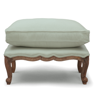 cream fabric footstool with wooden french style legs