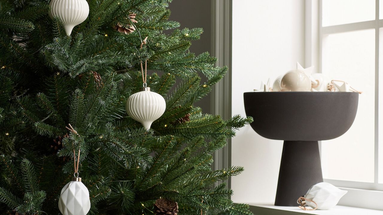 christmas tree with ornaments in a bowl