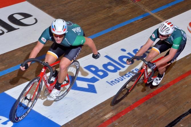 Viktor Manakov gets slung forward by Primus Haacht teammate Ivan Savitsky