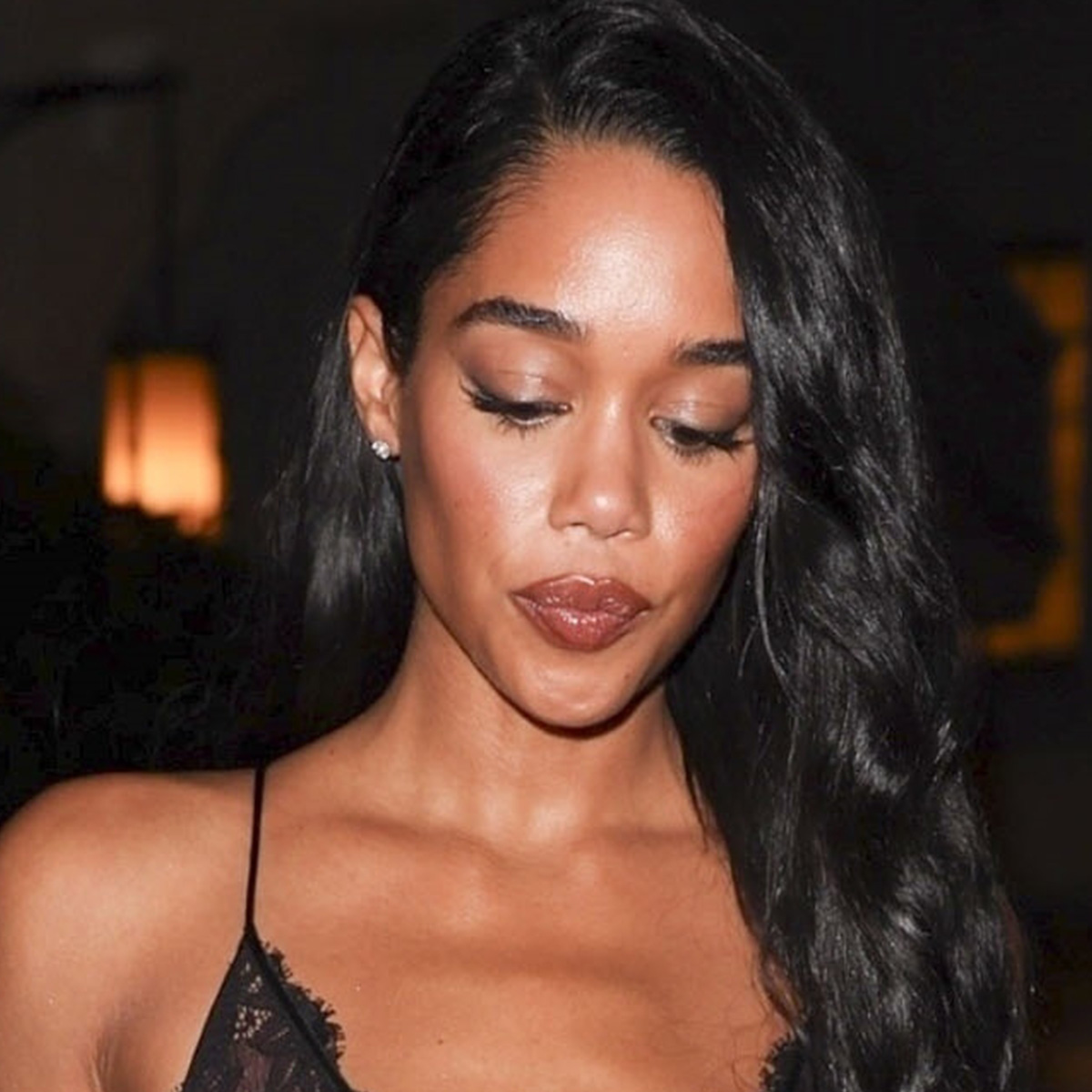 American actress and model Laura Harrier was seen attending the Giorgio Armani after-party at the Chateau Marmont in Los Angeles. She is wearing a black sheer lace dress by Dolce & Gabbana.