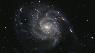 a spiral galaxy in deep space