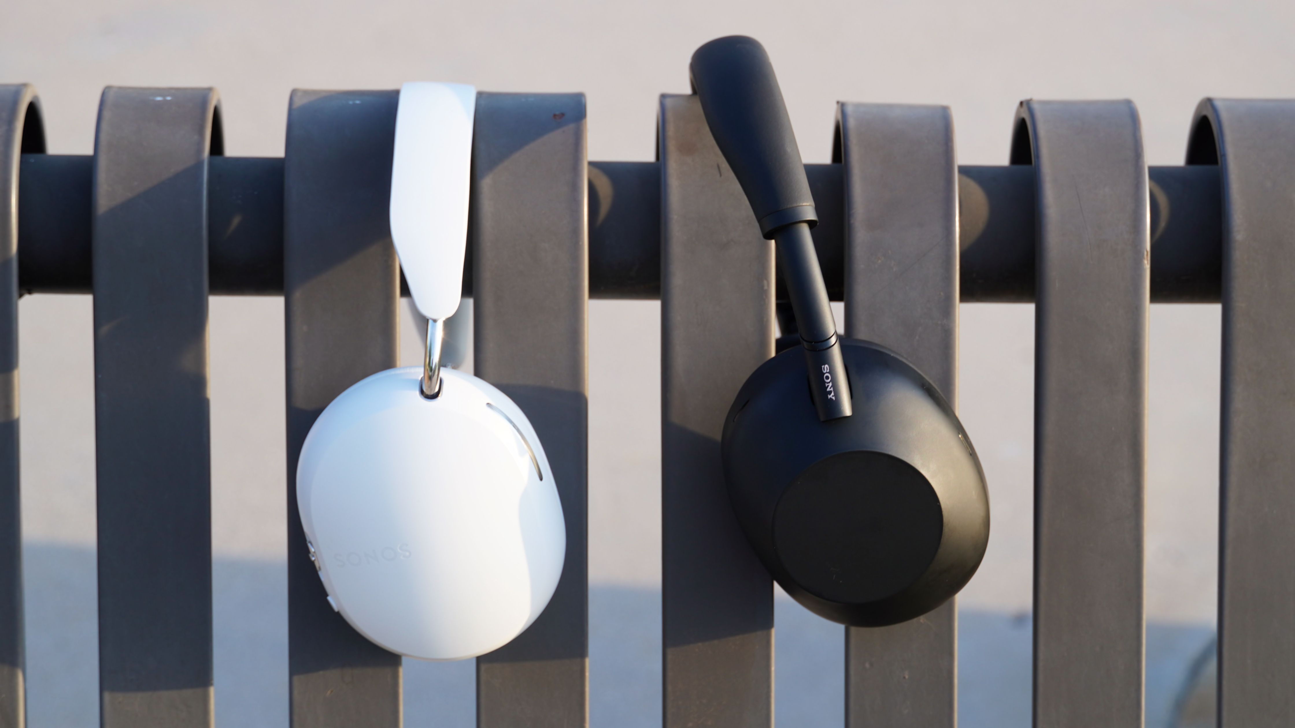 The Sonos Ace in white beside the Sony WH-1000XM6 in black.