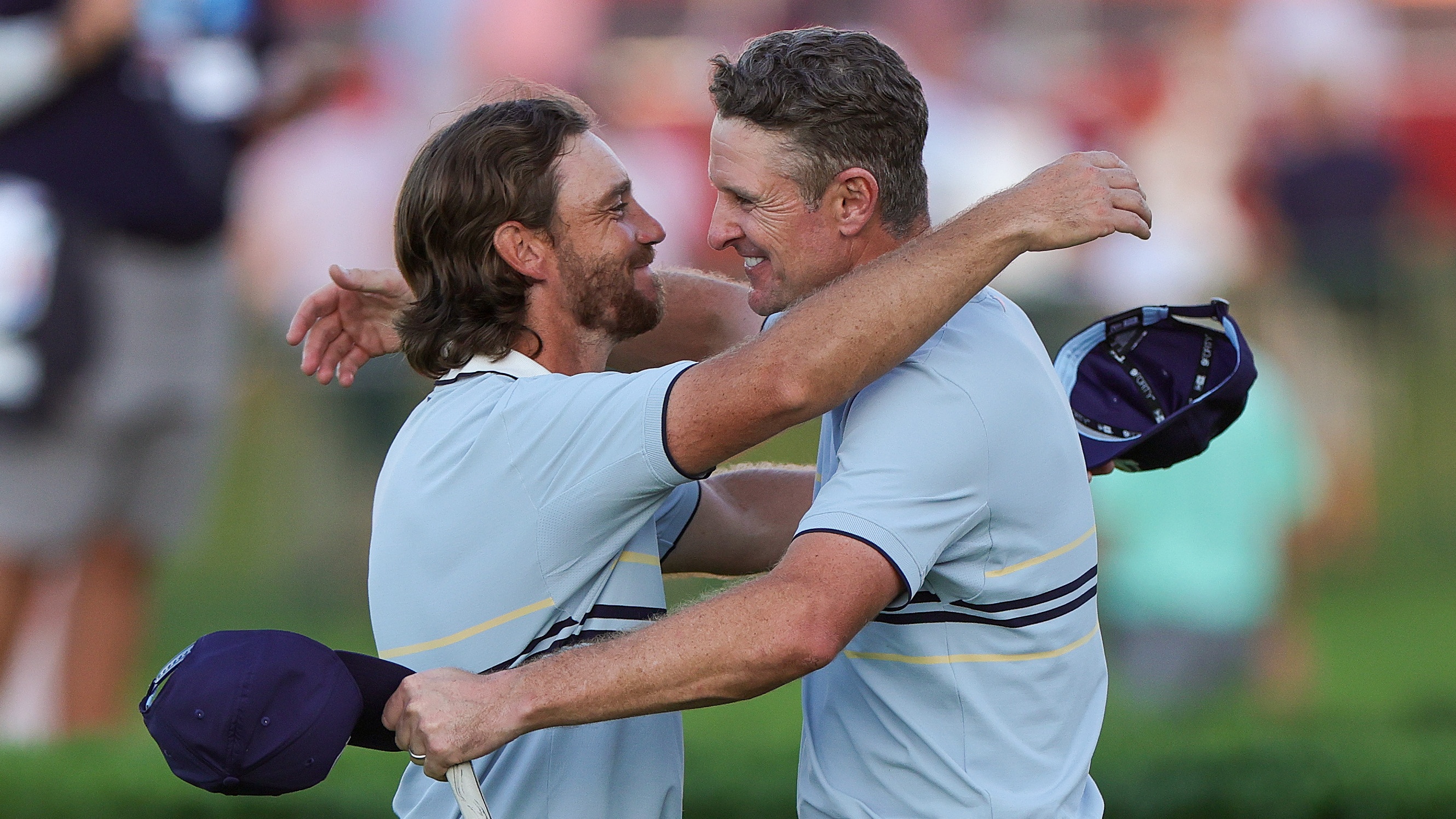 Tommy Fleetwood of Team Europe celebrates with teammate Justin Rose on the 18th hole green after they defeated Bryson DeChambeau and Ben Griffin of Team United States, 1-up, during the Friday afternoon four-ball matches of the 2025 Ryder Cup at Black Course at Bethpage State Park Golf Course on September 26, 2025 in Farmingdale, New York.