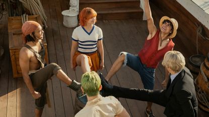 Netflix's One Piece still featuring all of the Straw Hats from the show on Going Merry