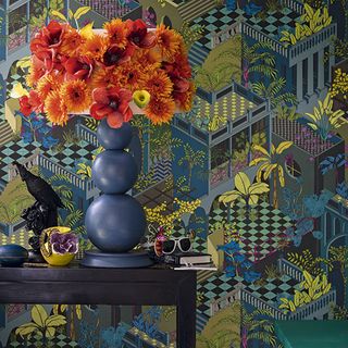 vibrant hallway with tropical print wallpaper and flower vase