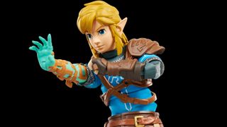 Link reaches out an arm against a plain black background