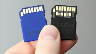 A UHS-II card (right) can be differentiated from a UHS-I card (left) by the second row of pins
