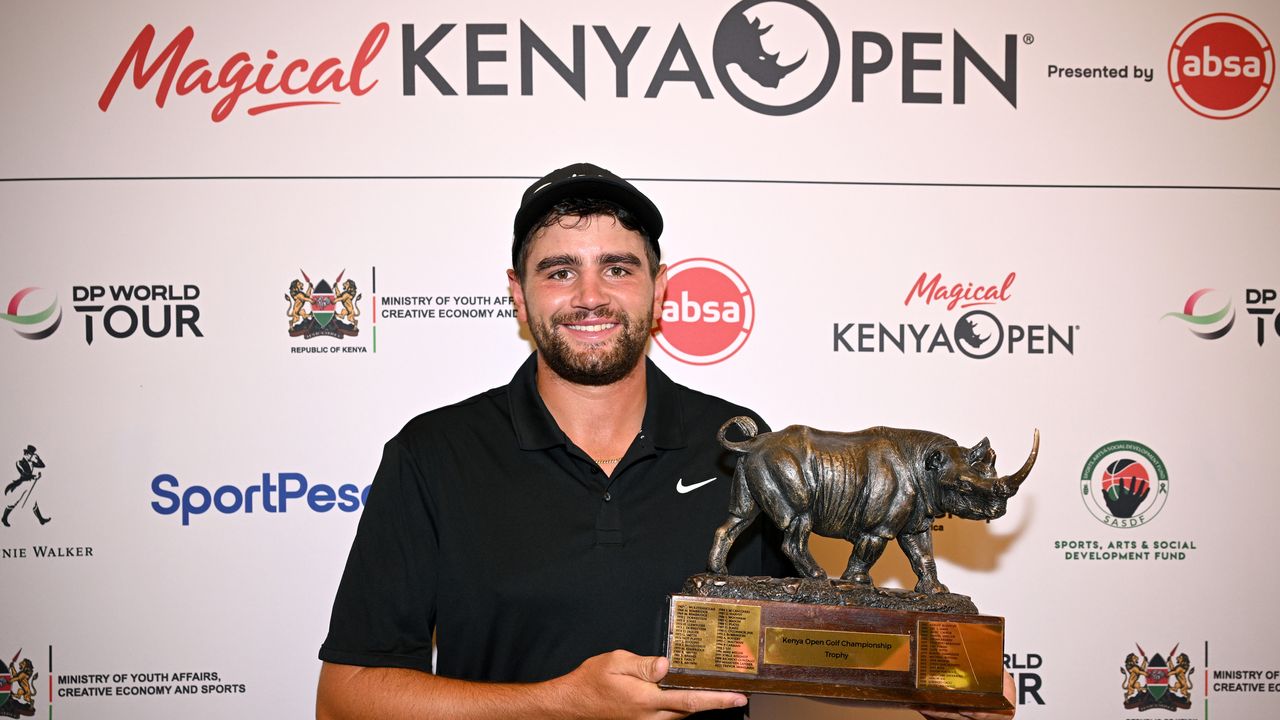 Casey Jarvis poses with the Magical Kenya Open trophy after winning in 2026