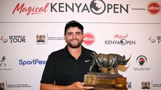 Casey Jarvis poses with the Magical Kenya Open trophy after winning in 2026