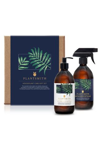 houseplant care box with two bottles and a gift box