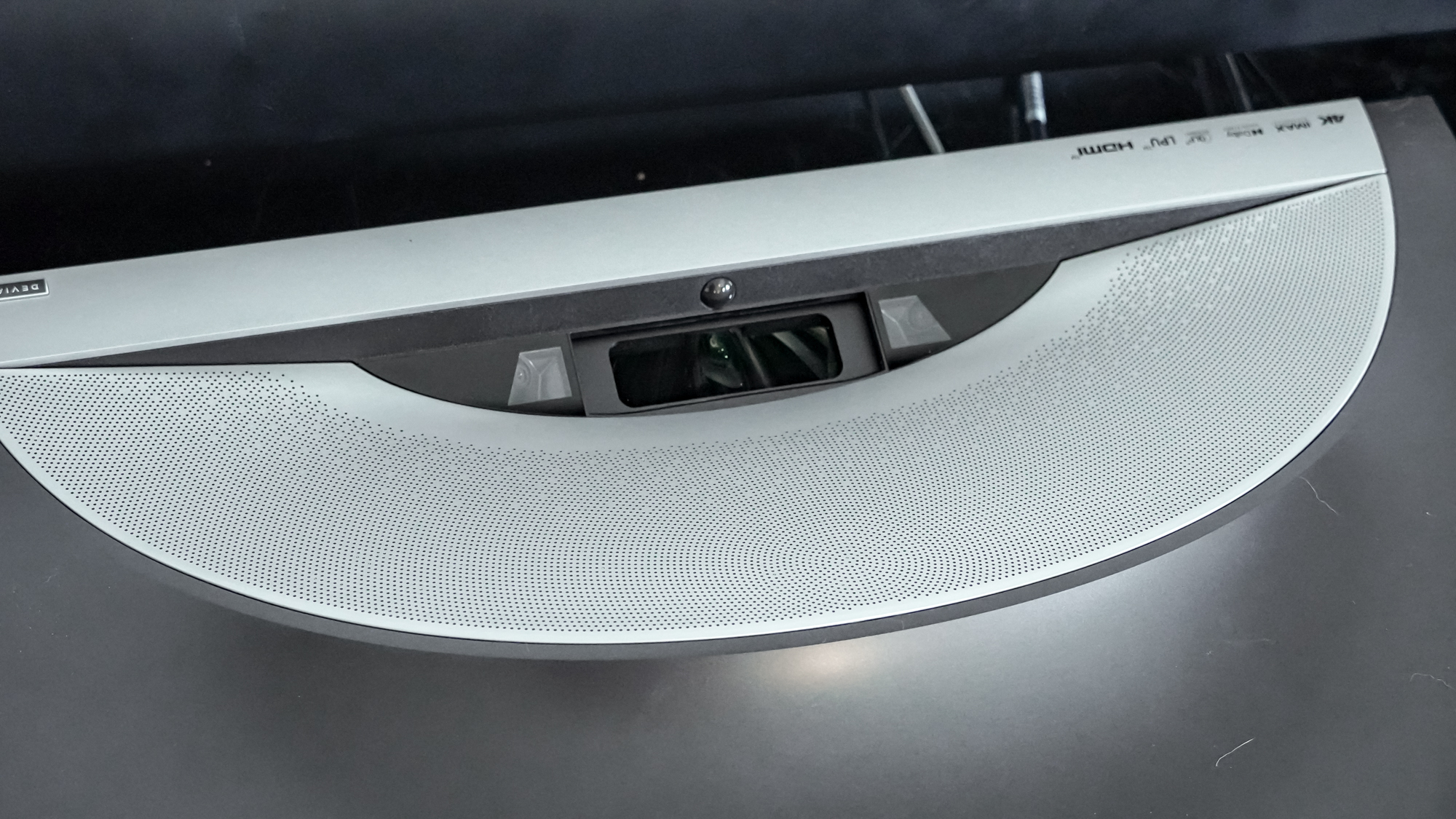 The lenses on a Hisense PX4 Pro projector