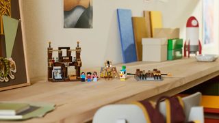 A collection of Lego Minecraft minifigures and scenery laid out on a wooden table