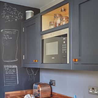 kitchen with blackboard wall and toaster