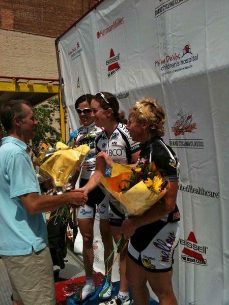Tibco's Jo Kiesanowski gets her prizes on the podium.