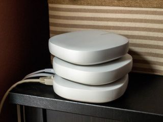 A stack of three Connect Home nodes.