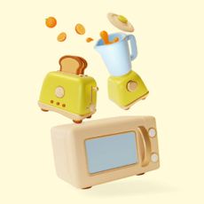 Microwave, toaster, and blender on a yellow background