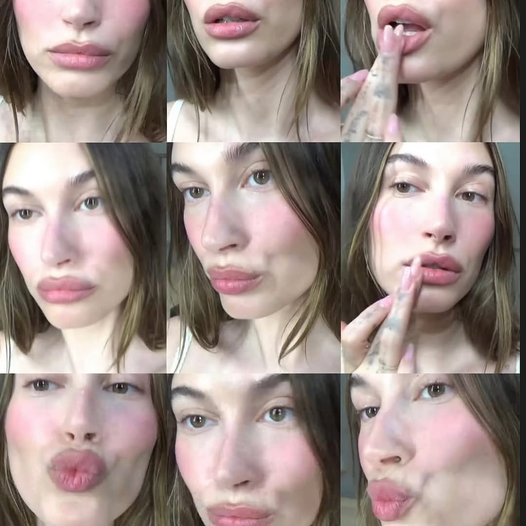 A photo of Hailey Bieber showing off berry pink cheeks and lips in a photo dump shared to Instagram.