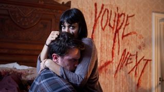 Nicholas Tucci and Wendy Glenn in "You're Next"