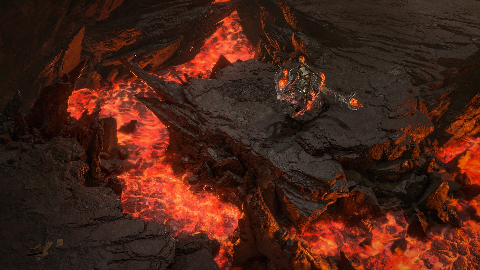 The player rides a demon horse to the edge of a river of lava in a rocky area in Diablo 4: Lord of Hatred