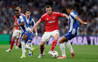 Chris Wood of Nottingham Forest is challenged by Thiago Silva of FC Porto during the UEFA Europa League 2025/26 Quarter-Final Leg One match between FC Porto and Nottingham Forest FC