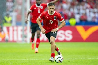 Austria Euro 2024 squad Christoph Baumgartner of Austria controls the ball during the UEFA EURO 2024 group stage match between Poland and Austria at Olympiastadion on June 21, 2024 in Berlin, Germany. (Photo by Mateusz Slodkowski/Getty Images)