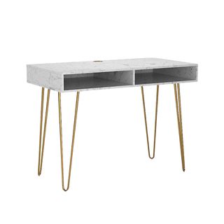 A marble style desk with gold legs