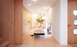 Prefabricated house with wooden flooring and wooden staircase
